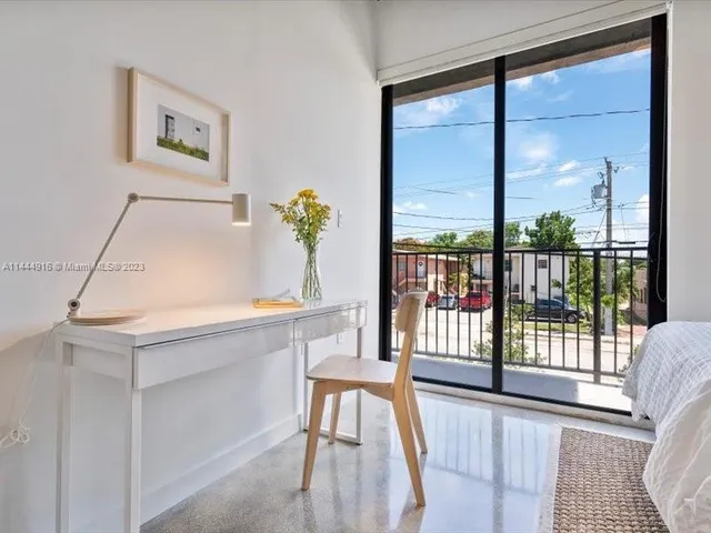 a view of a living room and a window