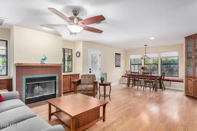 a kitchen with stainless steel appliances granite countertop a refrigerator a stove top oven a sink and dishwasher