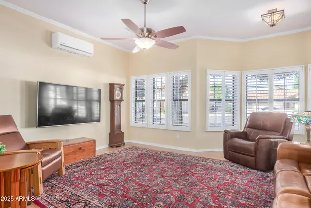 a living room with furniture and a window