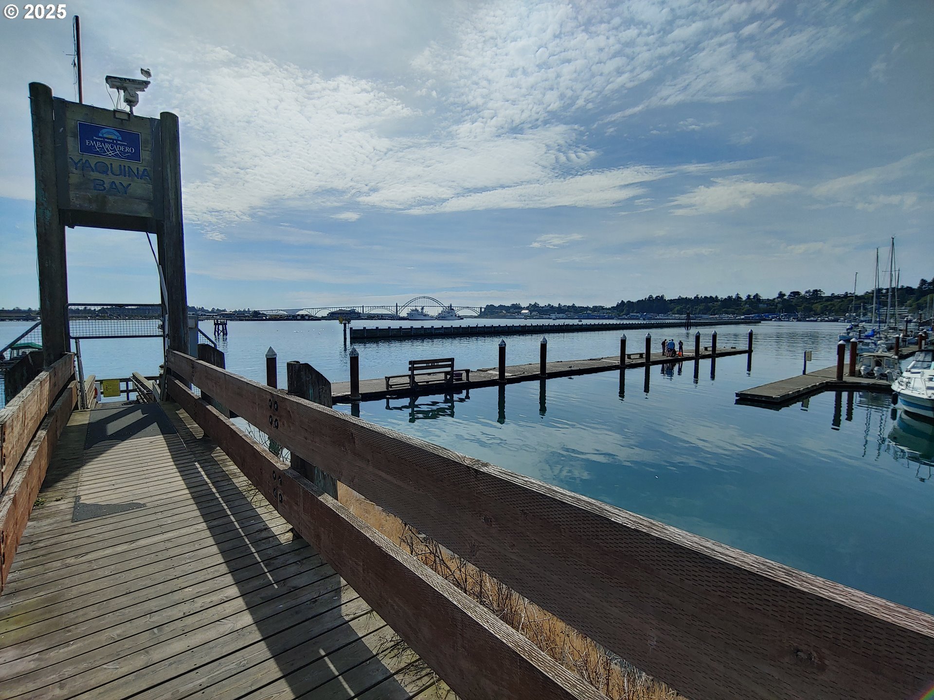 1000 Southeast Bay Blvd. Boulevard, Unit 124 Newport, OR 97365 - Photo 19 of 22 a view of a balcony with wooden chairs