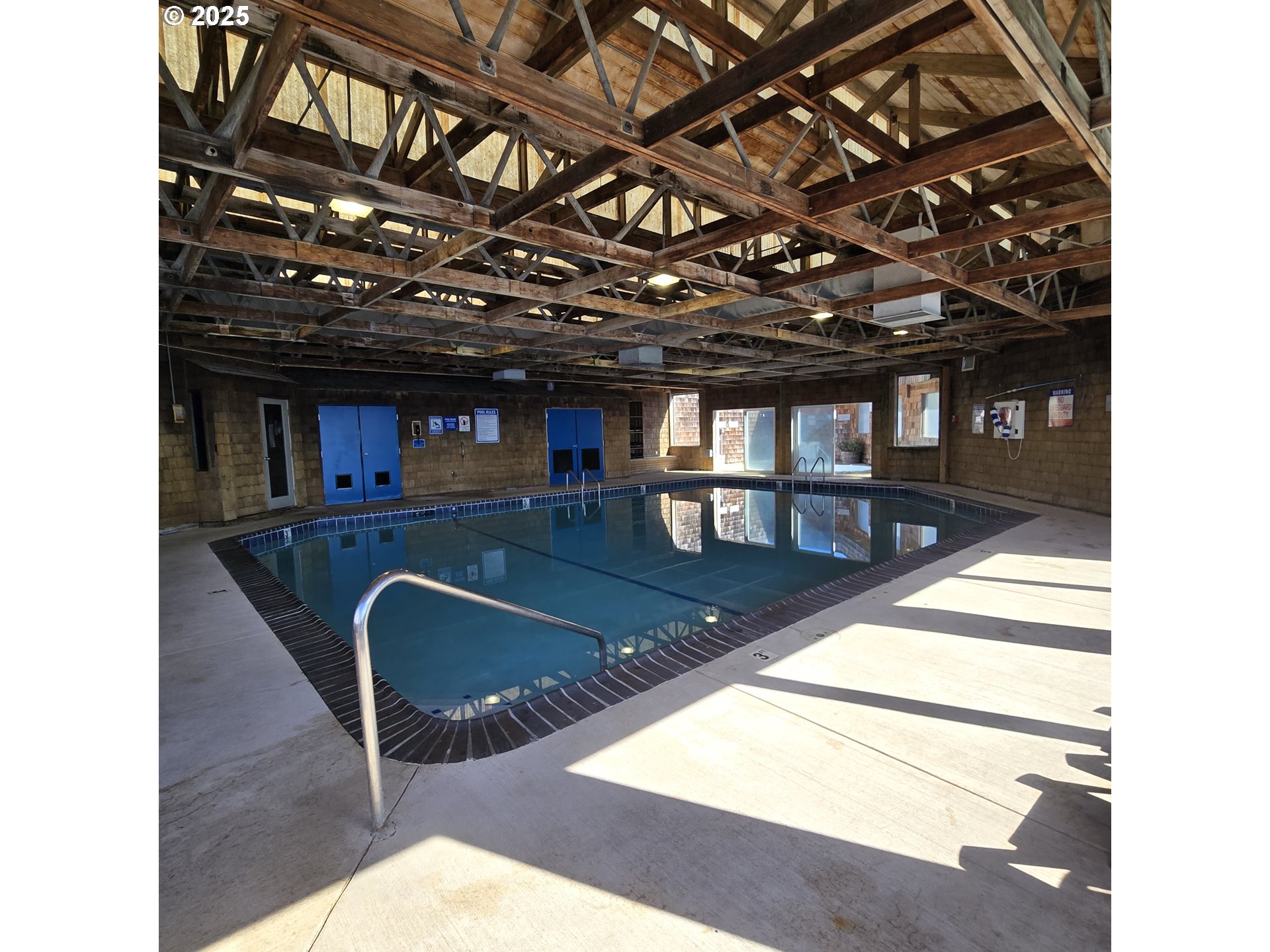 1000 Southeast Bay Blvd. Boulevard, Unit 124 Newport, OR 97365 - Photo 22 of 22 a view of a swimming pool with a patio