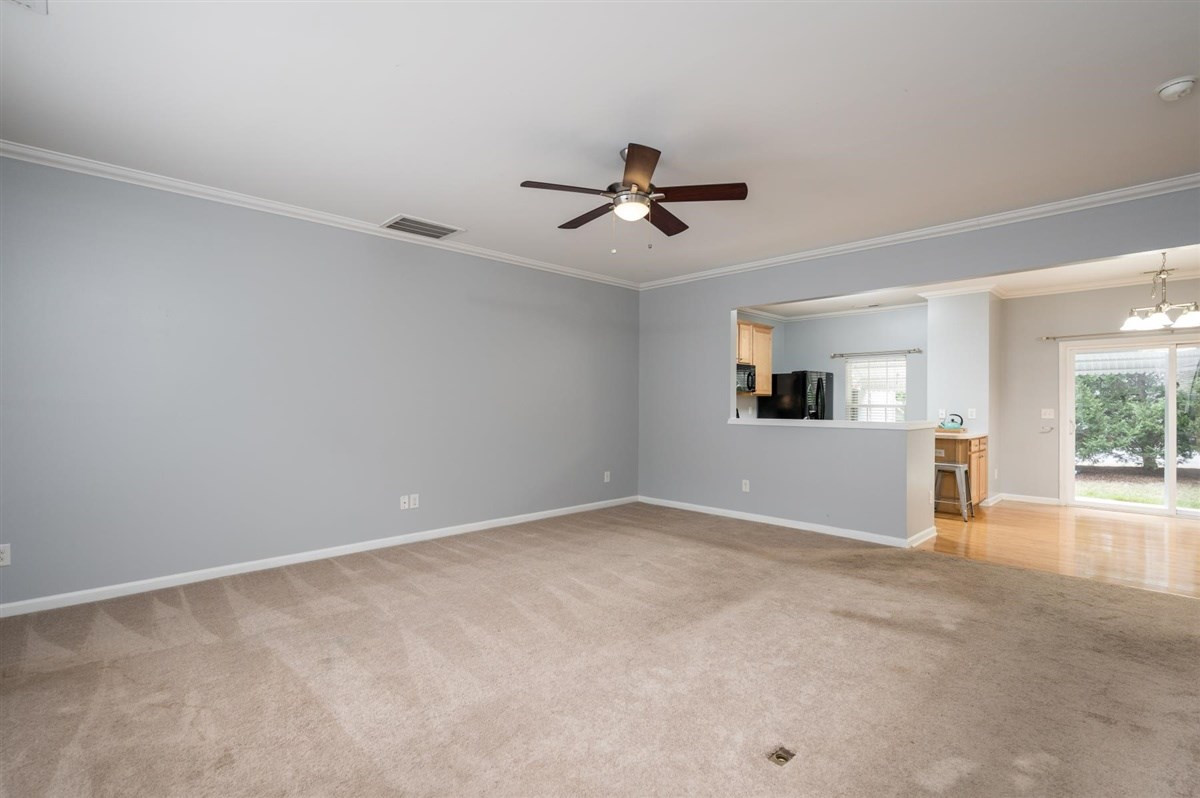 8311 Clasara Circle Raleigh, NC 27613 - Photo 6 of 27 Very spacious living room opens to a great kitchen! Living Room