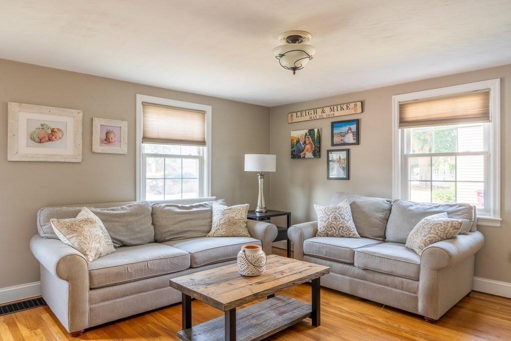 70 Brae Road Weymouth, MA 02191 - Photo 2 of 16 a living room with furniture and a window
