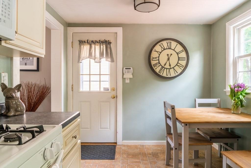 70 Brae Road Weymouth, MA 02191 - Photo 4 of 16 a view of a dining room with furniture and a large window