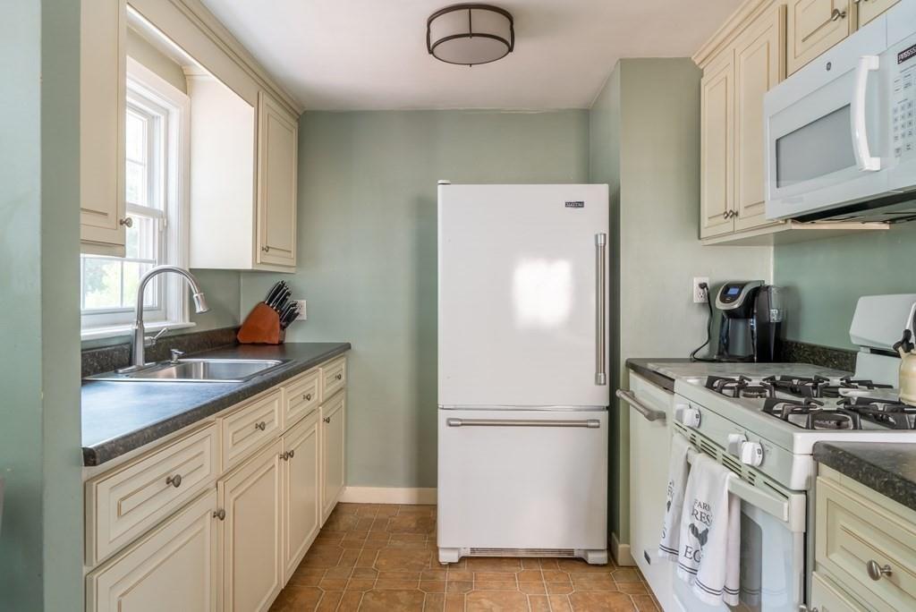 70 Brae Road Weymouth, MA 02191 - Photo 6 of 16 a kitchen with appliances a sink and cabinets
