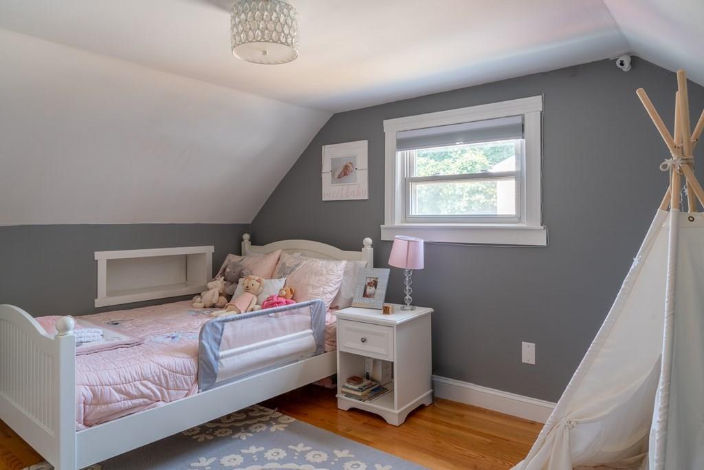70 Brae Road Weymouth, MA 02191 - Photo 8 of 16 a bedroom with furniture and a window