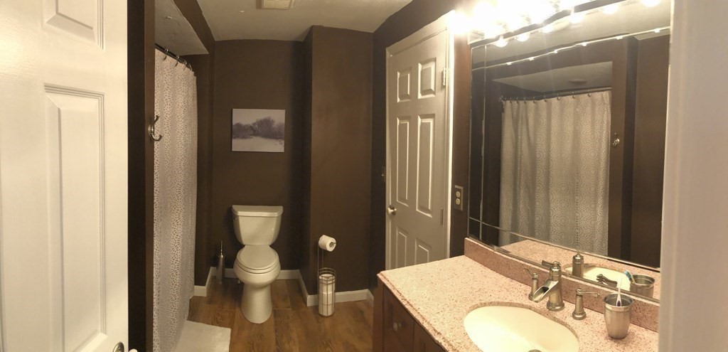 36 Atkins Road, Unit B5 Sandwich, MA 02537 - Photo 12 of 23 a bathroom with a granite countertop sink toilet and shower