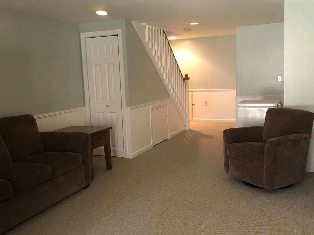 36 Atkins Road, Unit B5 Sandwich, MA 02537 - Photo 17 of 23 a living room with furniture and a window