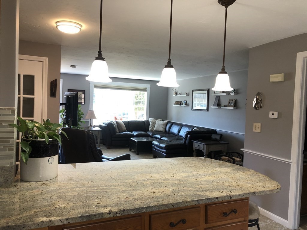 36 Atkins Road, Unit B5 Sandwich, MA 02537 - Photo 7 of 23 a kitchen with a table and chairs