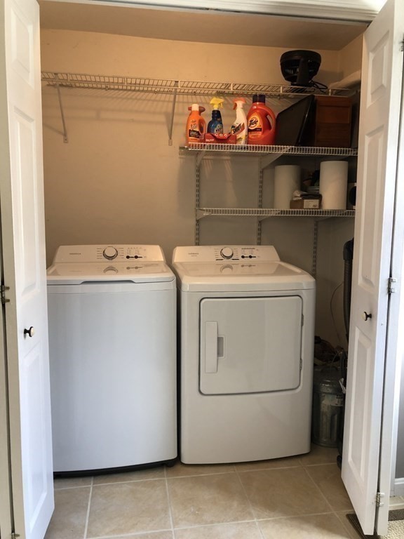 36 Atkins Road, Unit B5 Sandwich, MA 02537 - Photo 9 of 23 a utility room with dryer and washer