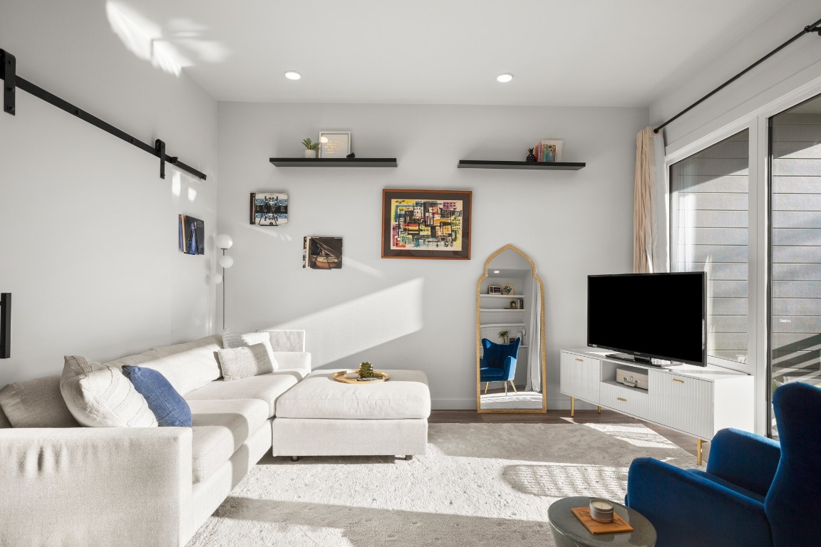 4004 Banister Lane, Unit 202 Austin, TX 78704 - Photo 12 of 23 a living room with furniture and a flat screen tv