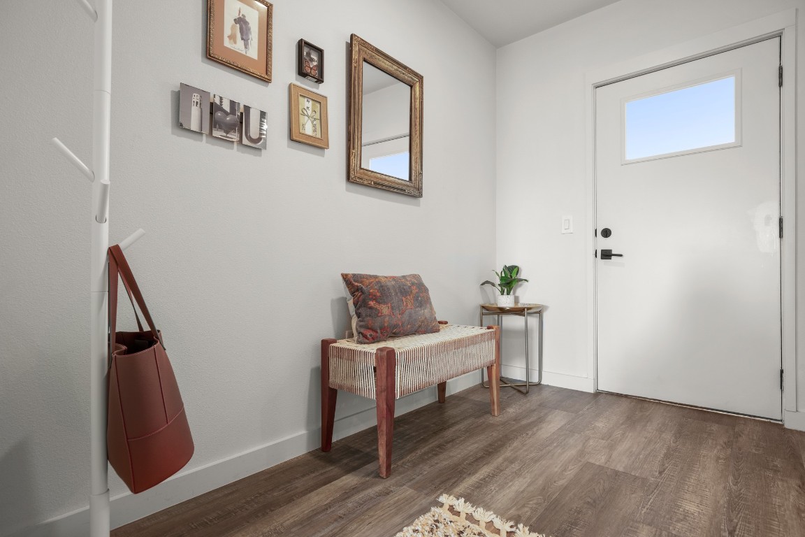 4004 Banister Lane, Unit 202 Austin, TX 78704 - Photo 2 of 23 a living room with furniture and wooden floor