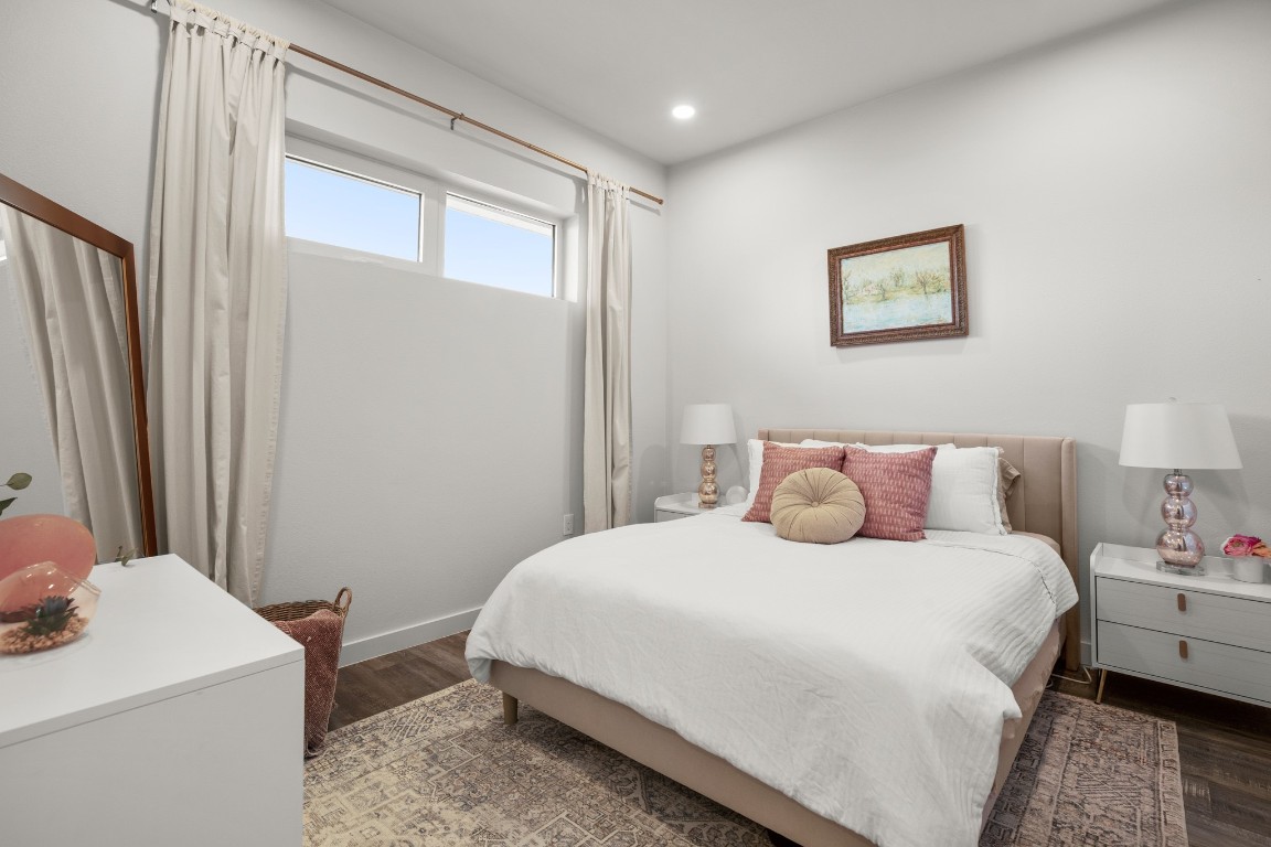 4004 Banister Lane, Unit 202 Austin, TX 78704 - Photo 8 of 23 a bedroom with a bed and a table