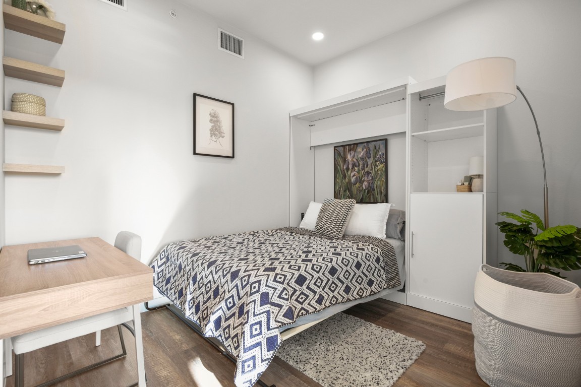 4004 Banister Lane, Unit 202 Austin, TX 78704 - Photo 10 of 23 a bedroom with a bed and a potted plant