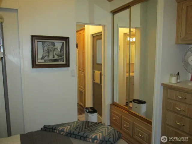 a bedroom with a bed and furniture