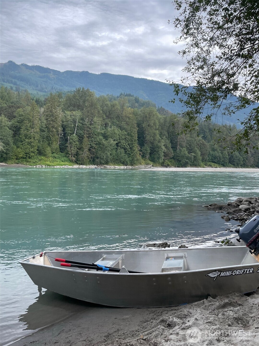 9391 Colony Lane Concrete, WA 98237 - Photo 28 of 35 a view of a lake with a mountain in the background