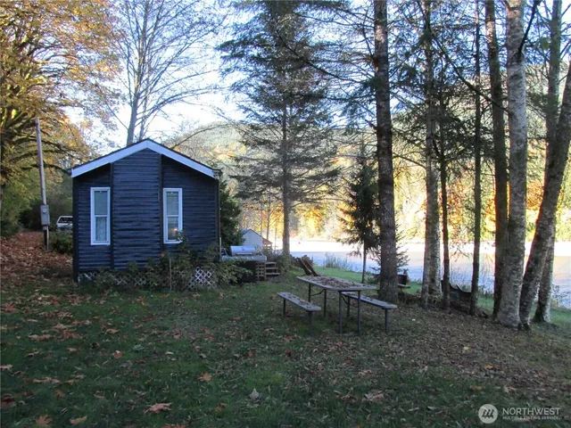 a backyard of a house with lots of green space