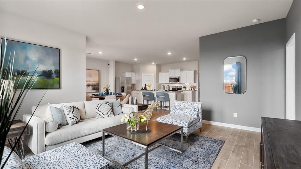 1207 Patti Lane Decatur, TX 76234 - Photo 11 of 37 a living room with furniture kitchen view and a large window