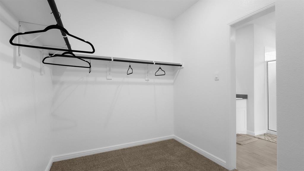 1207 Patti Lane Decatur, TX 76234 - Photo 21 of 37 a view of a room with rack on the wall
