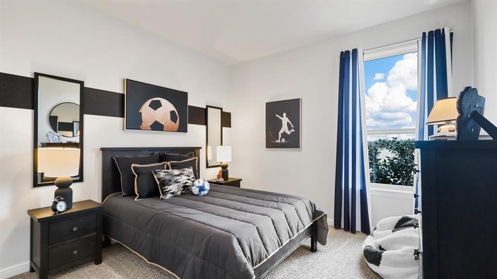 1207 Patti Lane Decatur, TX 76234 - Photo 26 of 37 a bedroom with a bed and a window