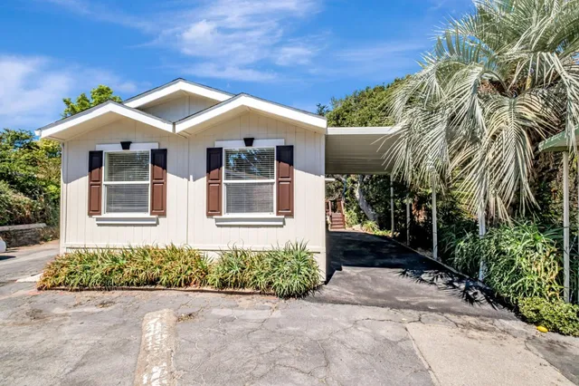 a view of a back yard of the house