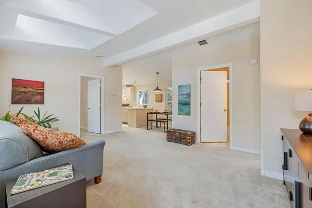 a living room with furniture and a couch