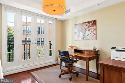 a workspace with furniture and window