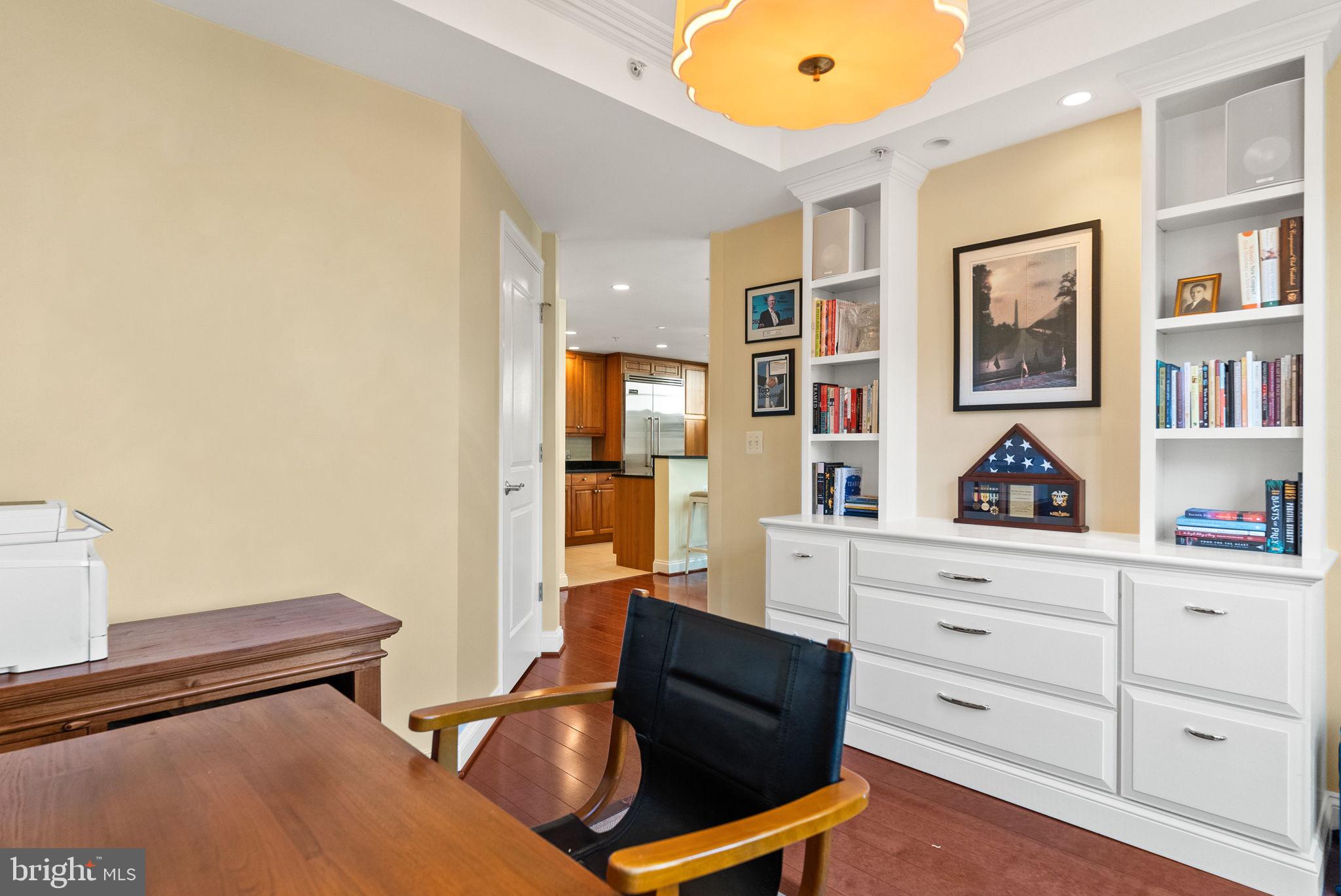 2501 Wisconsin Avenue Northwest, Unit 302 Washington, DC 20007 - Photo 16 of 33 a hallway with a bed and dresser