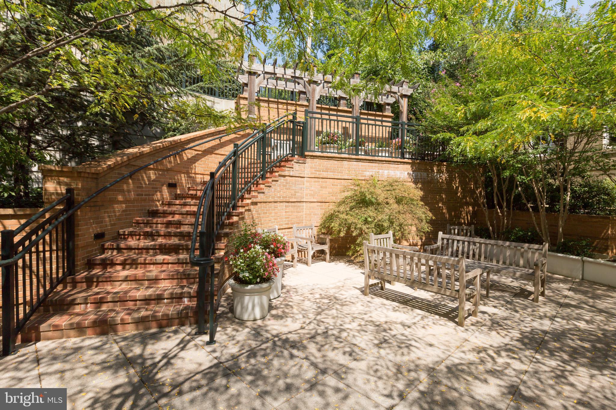 2501 Wisconsin Avenue Northwest, Unit 302 Washington, DC 20007 - Photo 25 of 33 a view of pathway along with wooden stairs