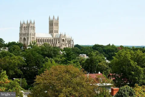 a view of a street with cars