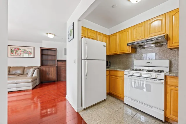 a view of parking garage with cars