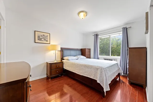 a kitchen with stainless steel appliances granite countertop a refrigerator a stove a sink and a refrigerator