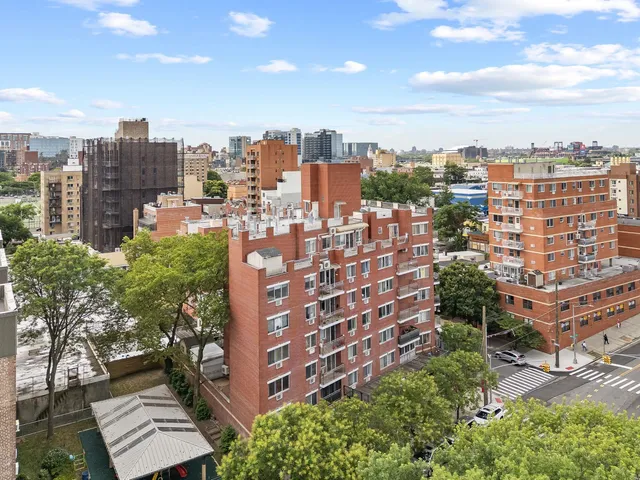 a view of a city with tall buildings