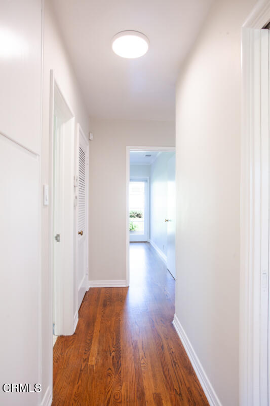 2345 Lambert Drive Pasadena, CA 91107 - Photo 17 of 25 a view of a room with wooden floor and a bathroom