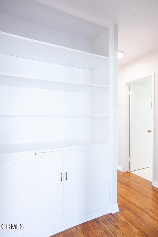 2345 Lambert Drive Pasadena, CA 91107 - Photo 18 of 25 a view of a room with wooden floor
