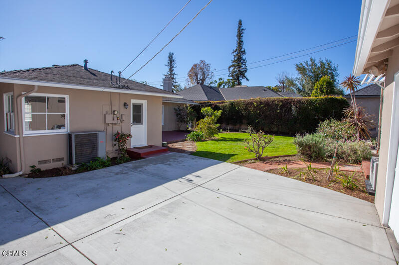 2345 Lambert Drive Pasadena, CA 91107 - Photo 23 of 25 a front view of a house with a yard and potted plants