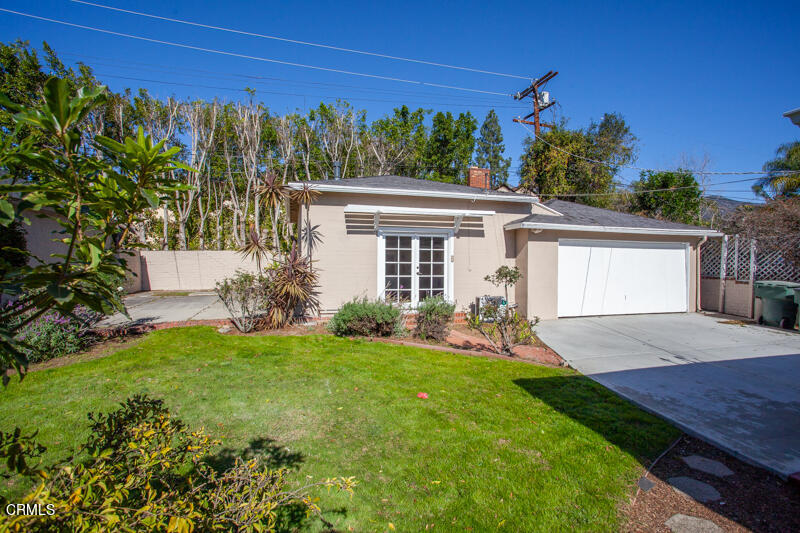 2345 Lambert Drive Pasadena, CA 91107 - Photo 24 of 25 a front view of a house with a yard and garage