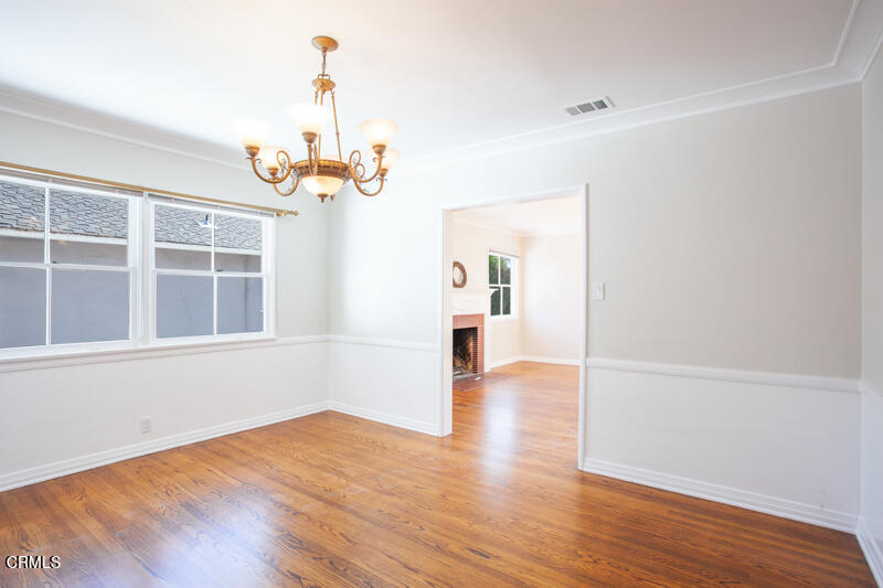 2345 Lambert Drive Pasadena, CA 91107 - Photo 4 of 25 wooden floor in an empty room with a window