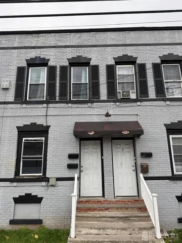a house view with a outdoor space