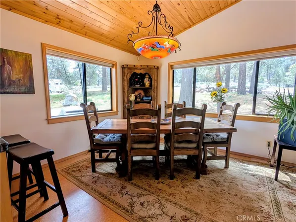 a bed room with a bed and a chair