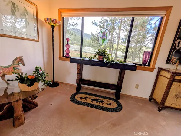 a bath tub sitting next to a window