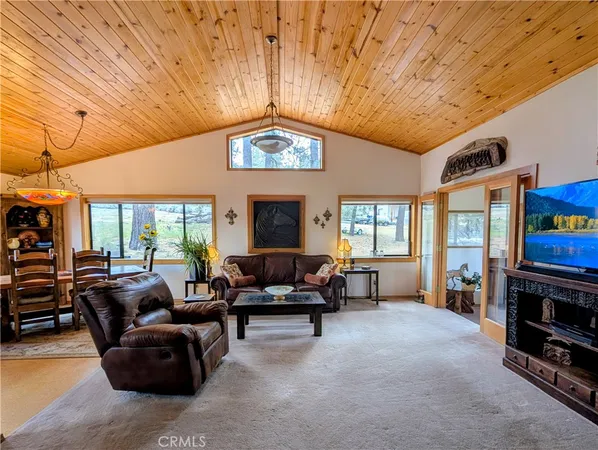 a bedroom with a bed and a table