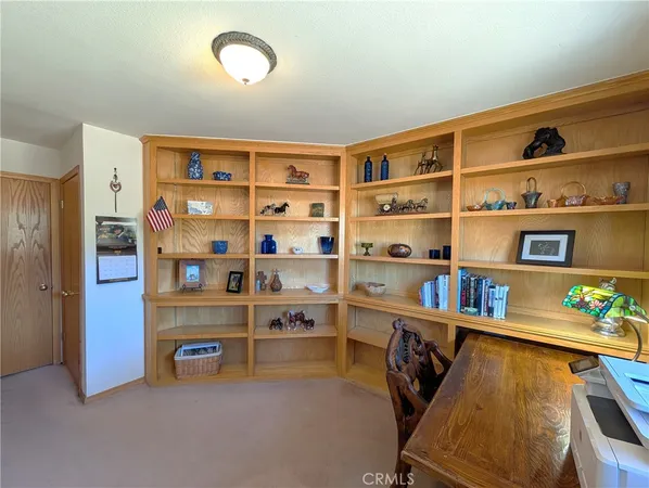 a view of a street with a building in the background