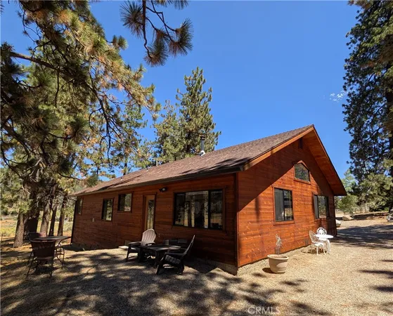 a kitchen with stainless steel appliances granite countertop a refrigerator and a stove