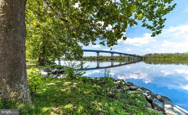 a view of a lake with a yard
