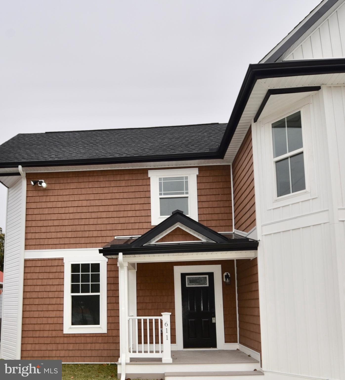 611 Main Street Sharptown, MD 21861 - Photo 35 of 37 a front view of a house with a porch