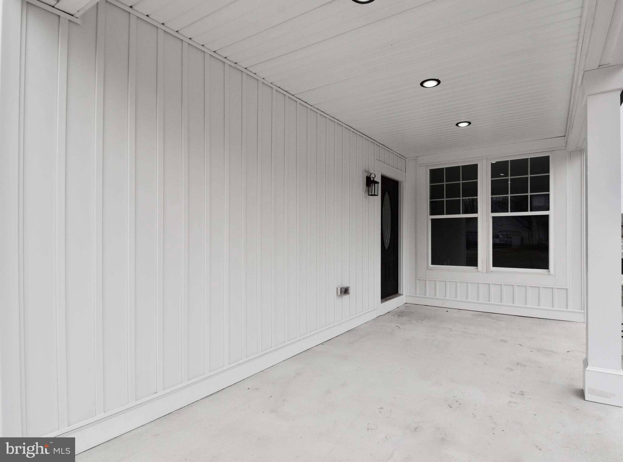 611 Main Street Sharptown, MD 21861 - Photo 36 of 37 a view of an empty room with a window