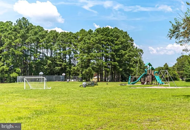 a view of a golf course with a fountain