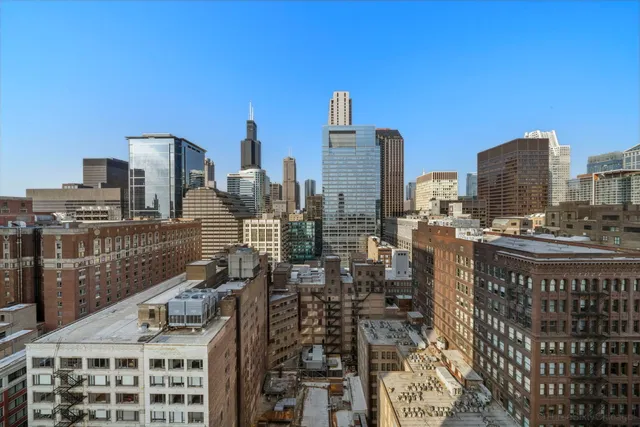 a view of city with tall buildings
