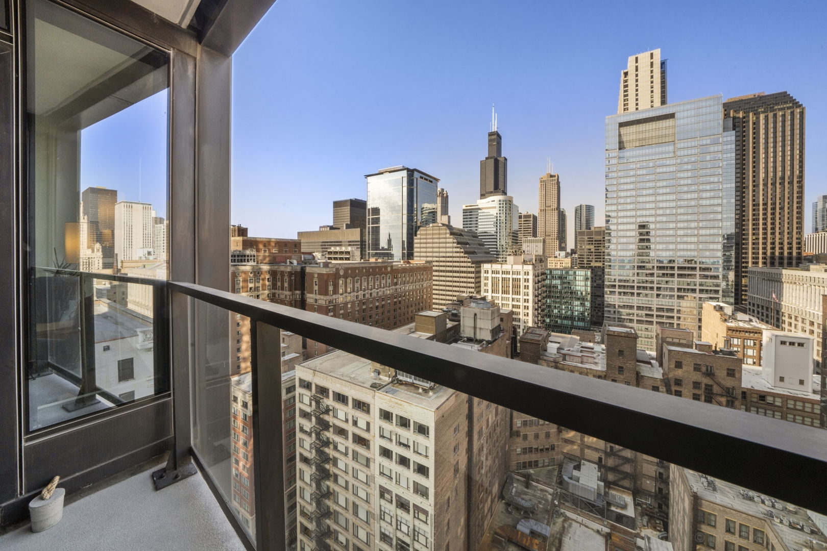 60 East Monroe Street, Unit 2606 Chicago, IL 60603 - Photo 10 of 34 a view of a city from a balcony